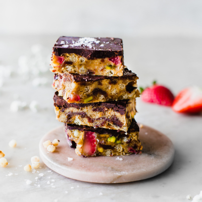 caramel fruit energy bars stacked on top of each other