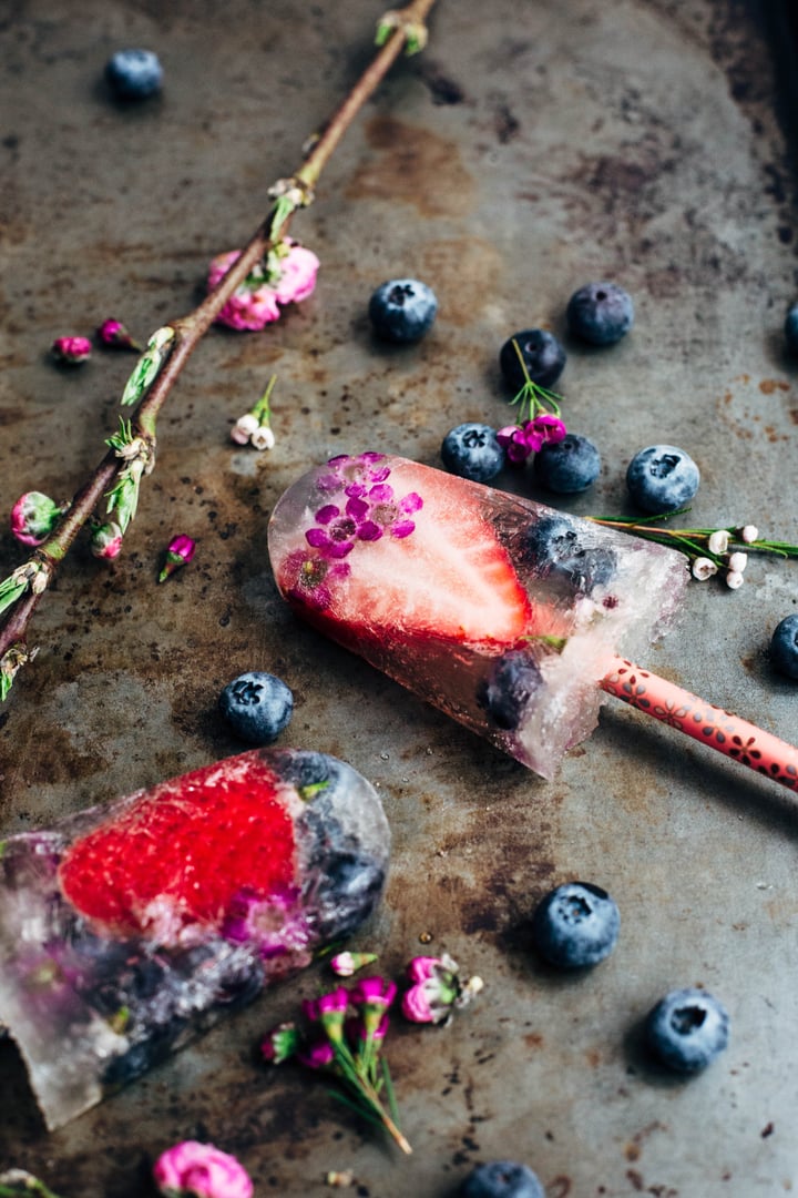 champagne berry popsicles with edible flowers