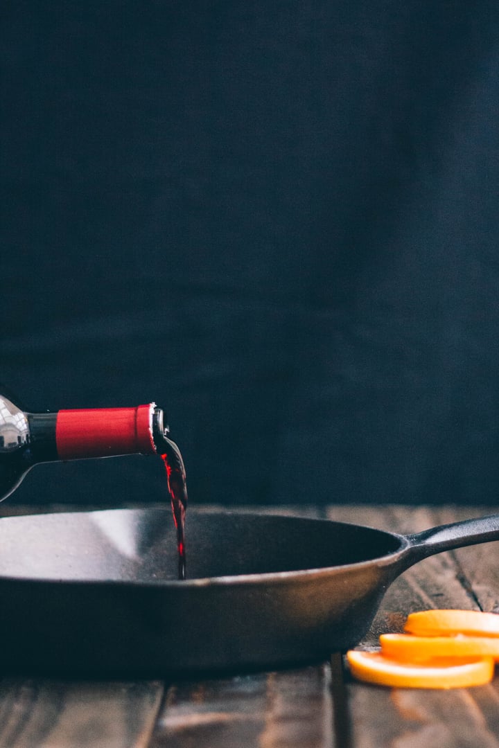 wine poured into cast iron skillet