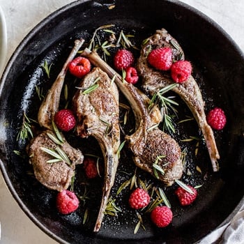 Lamb lollipops with raspberries