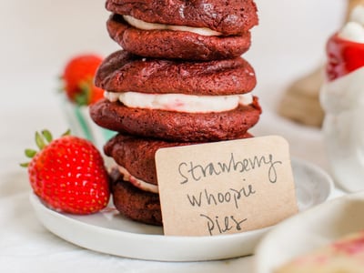 strawberry whoopie pies stacked with a note that says what they are