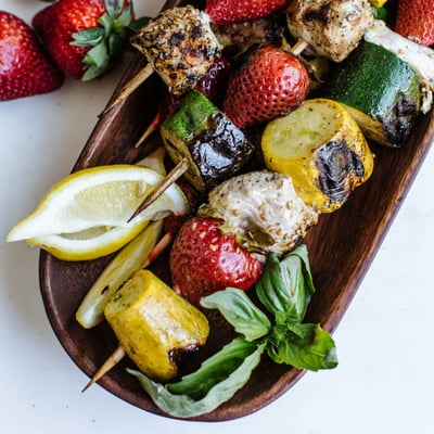 kabobs with strawberries, zucchinis, and squash 