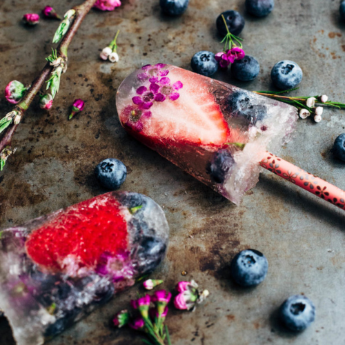 berry popsicles with flowers inside 