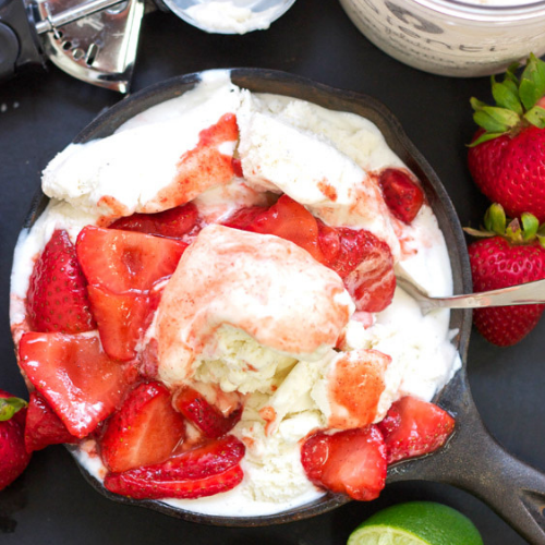 ice cream and strawberries in a cast iron skillet