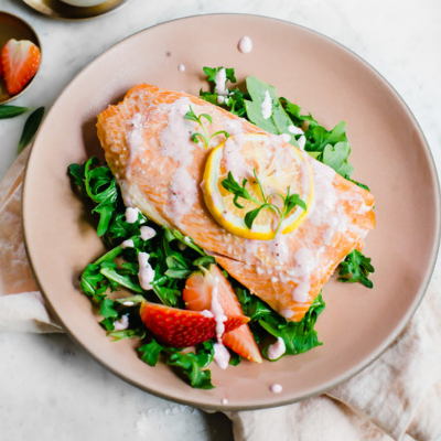 salmon with Crème Fraîche under arugula salad