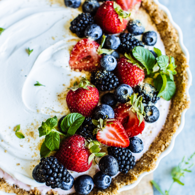 pecan crust tart topped with greek yogurt and berries