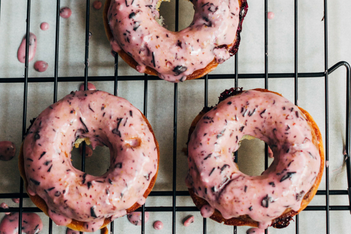 blueberry donuts on a cooling rack