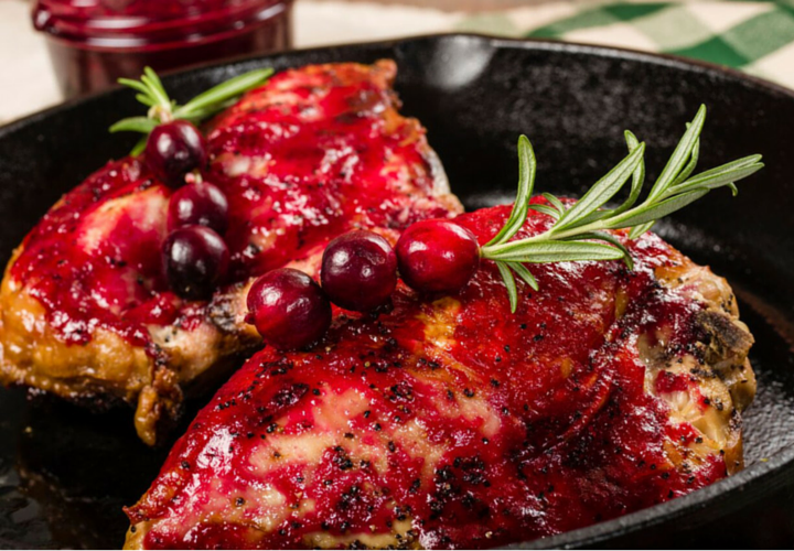 two pork tenderloins with a blackberry spread on top