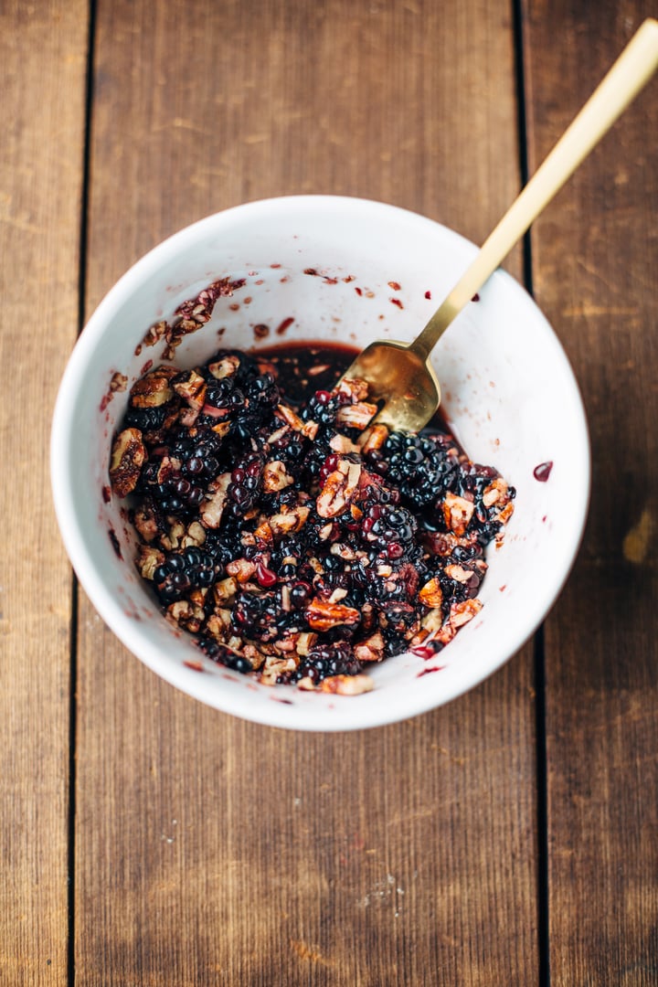 blackberries and pecans mashed in a bowl