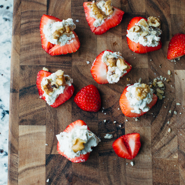 strawberry topped with blue cheese and walnuts bites