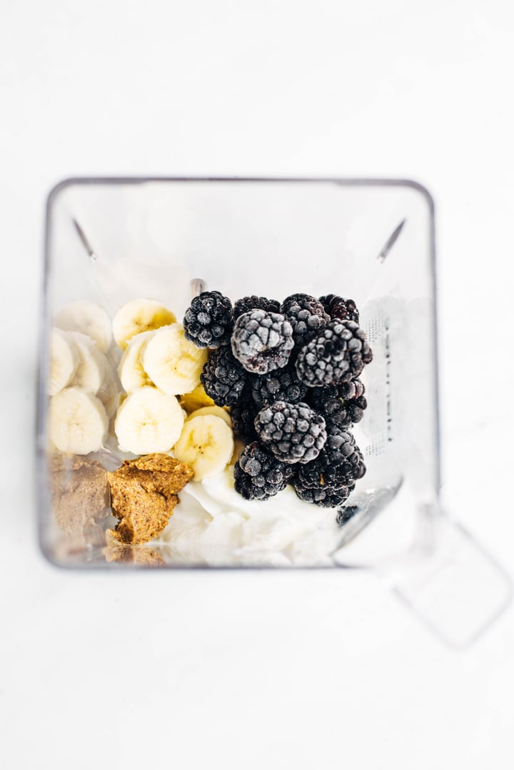 frozen blackberries, banana, almond butter, and ice in a blender