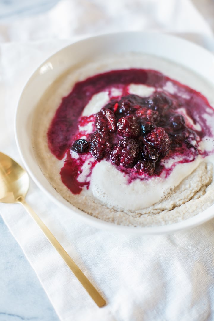 porridge topped with berry sauce