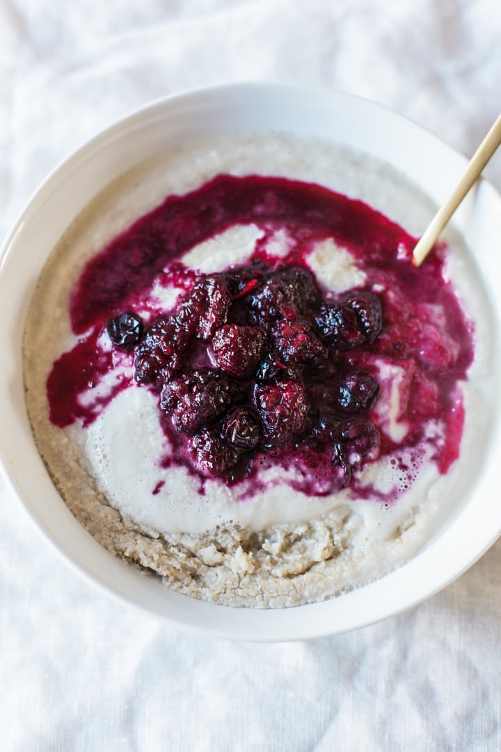 porridge topped with berry sauce