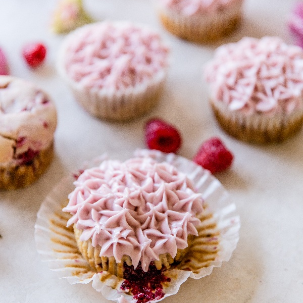 blackberry cupcakes with pink frosting