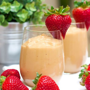 smoothie garnished with a strawberry