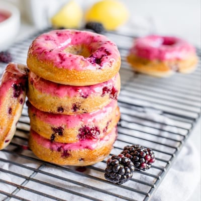 blackberry donuts with pink frosting