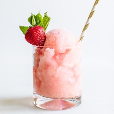 strawberry frose topped with a strawberry