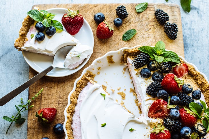 greek yogurt berry tart on a cutting board