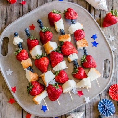 fourth of july skewers with strawberries, blueberries, and pound cake