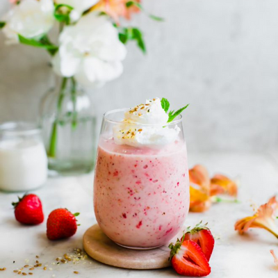 strawberry smoothie topped with whipped cream