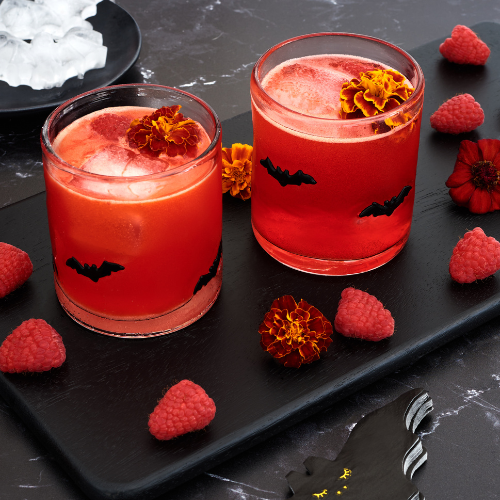 Raspberry paloma in a glass with bat decals